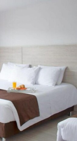 Imagen de la habitación del Hotel Bestmark Platinum. Foto 37