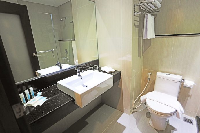 Imagen de la habitación del Hotel Beston Palembang. Foto 9