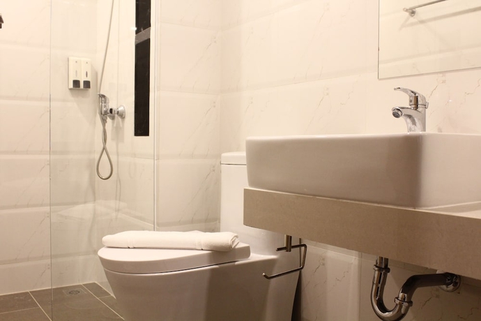 Imagen de la habitación del Hotel Beston Pattaya. Foto 12