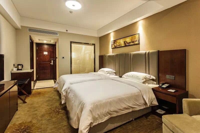Imagen de la habitación del Hotel Bestway Qujiang Xi'an. Foto 12