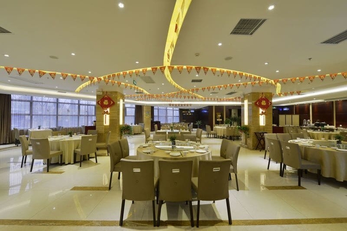 Imagen del bar/restaurante del Hotel Bestway Qujiang Xi'an. Foto 10