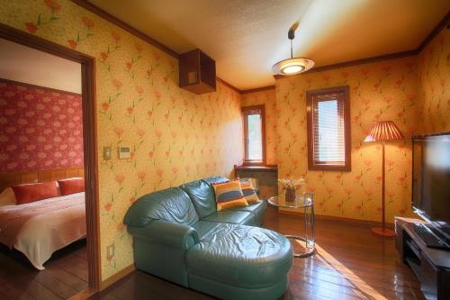Imagen de la habitación del Hotel Bettei Himawari. Foto 8