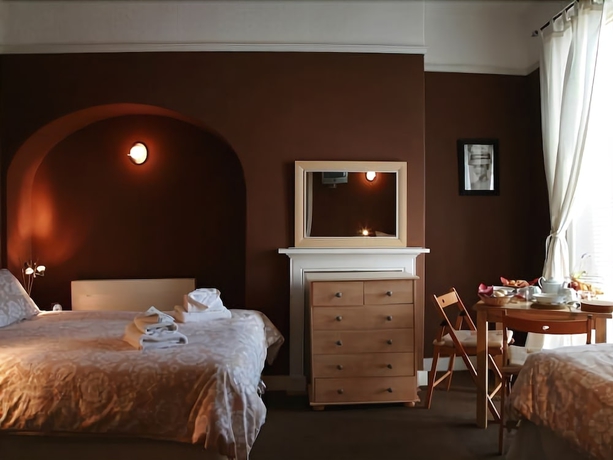 Imagen de la habitación del Hotel Beverley Guest House. Foto 14