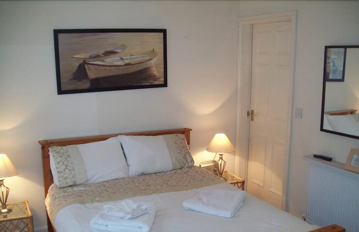 Imagen de la habitación del Hotel Beverley Guest House. Foto 16