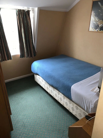 Imagen de la habitación del Hotel Beverley House. Foto 12