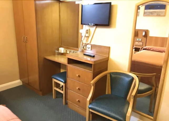 Imagen de la habitación del Hotel Beverley House. Foto 16