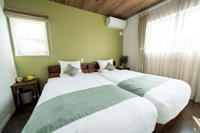 Imagen de la habitación del Hotel Beverly Hills Villa Miyakojima Resort. Foto 16