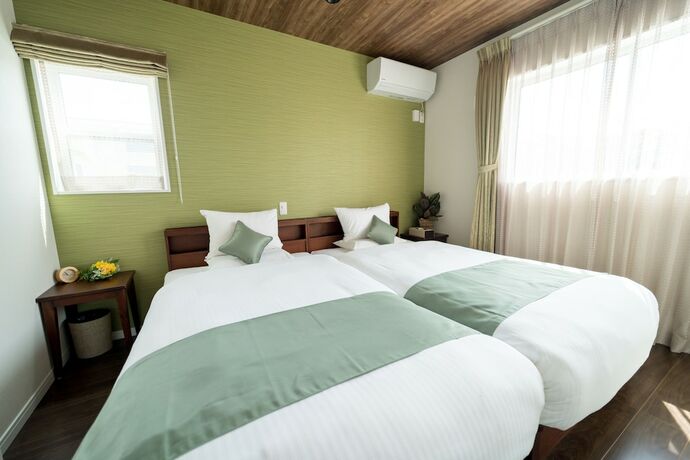 Imagen de la habitación del Hotel Beverly Hills Villa Miyakojima Resort. Foto 23