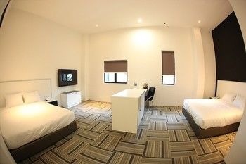 Imagen de la habitación del Hotel Beverly, Taiping. Foto 13