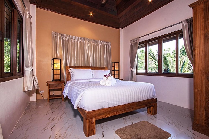 Imagen de la habitación del Hotel Beverly Thai House Pool Villa. Foto 6
