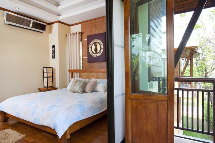 Imagen de la habitación del Hotel Beverly Thai House Pool Villa. Foto 7