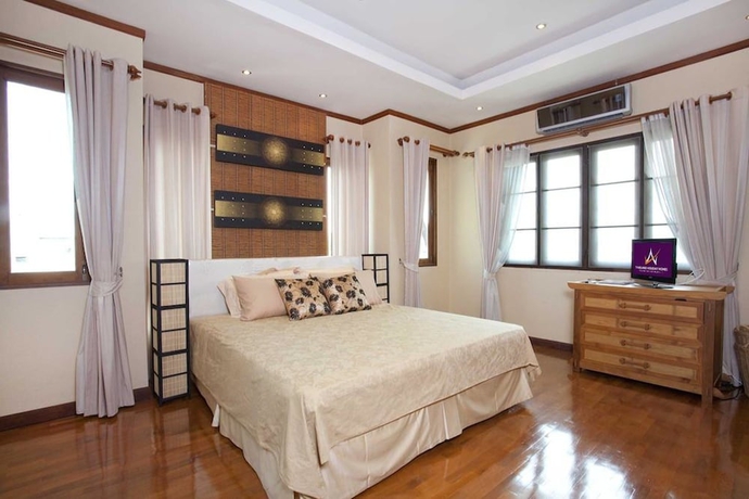 Imagen de la habitación del Hotel Beverly Thai House Pool Villa. Foto 8