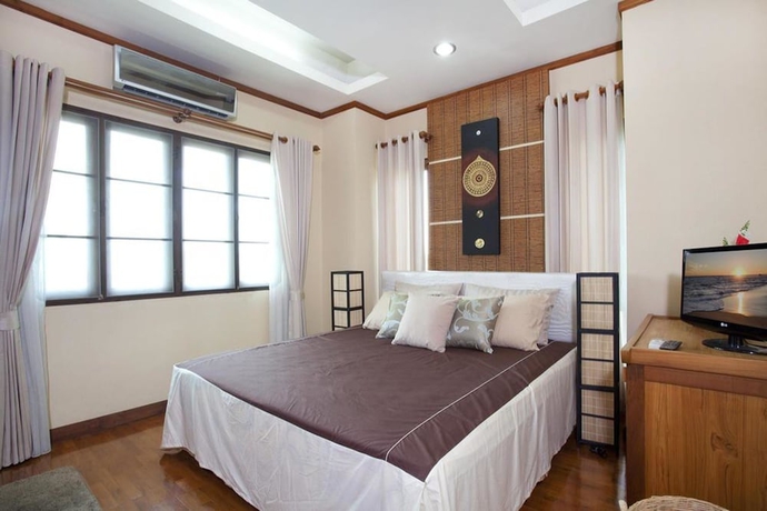 Imagen de la habitación del Hotel Beverly Thai House Pool Villa. Foto 9