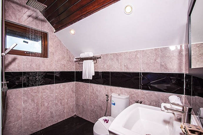 Imagen de la habitación del Hotel Beverly Thai House Pool Villa. Foto 16