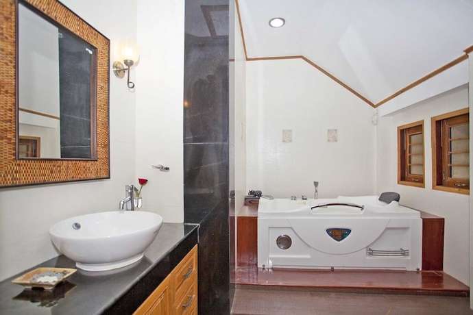 Imagen de la habitación del Hotel Beverly Thai House Pool Villa. Foto 19