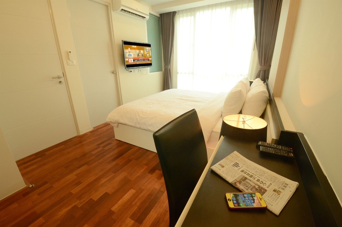 Imagen de la habitación del Hotel Beverly33. Foto 6