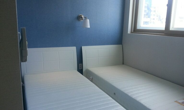 Imagen de la habitación del Hotel Bexco Hostel BandB. Foto 11