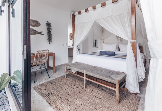 Imagen de la habitación del Hotel Beyond Bungalows. Foto 6