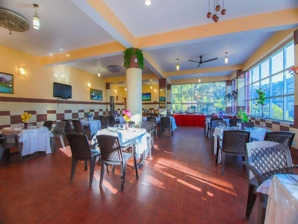 Imagen del bar/restaurante del Hotel Beyond Stay Oaktel Nainital. Foto 16