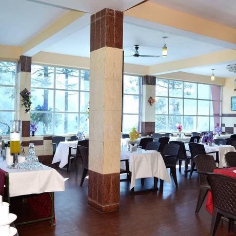 Imagen del bar/restaurante del Hotel Beyond Stay Oaktel Nainital. Foto 17