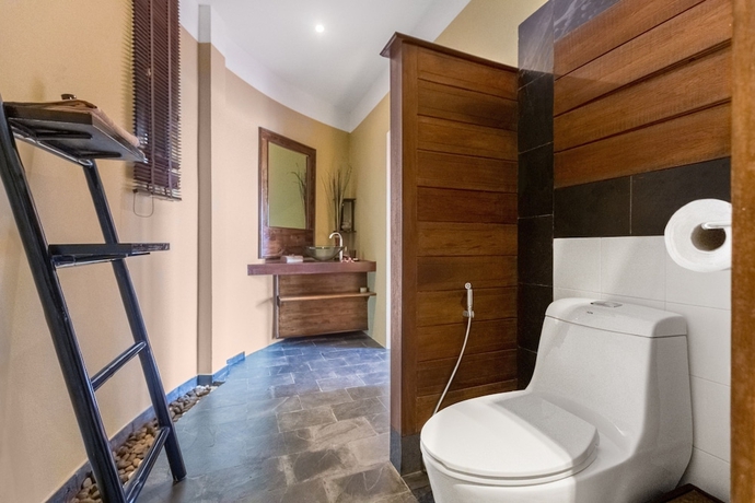 Imagen de la habitación del Hotel Beyond The Blue Horizon Villa Resort. Foto 6