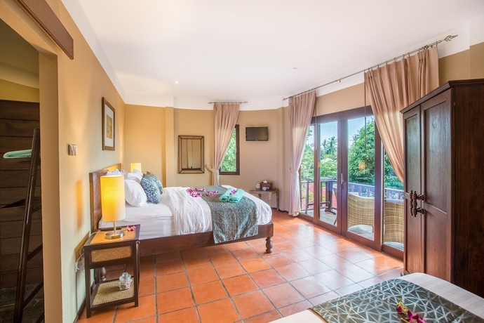 Imagen de la habitación del Hotel Beyond The Blue Horizon Villa Resort. Foto 9