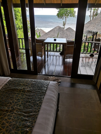 Imagen de la habitación del Hotel Beyond The Blue Horizon Villa Resort. Foto 13