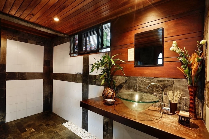 Imagen de la habitación del Hotel Beyond The Blue Horizon Villa Resort. Foto 17