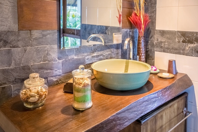 Imagen de la habitación del Hotel Beyond The Blue Horizon Villa Resort. Foto 18