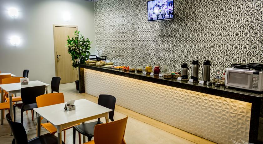 Imagen del bar/restaurante del Hotel Bh Inn Palmares - By Up - Acesso Cristiano Machado. Foto 3