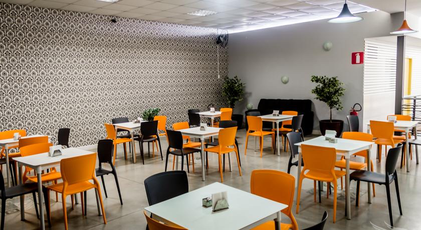 Imagen del bar/restaurante del Hotel Bh Inn Palmares - By Up - Acesso Cristiano Machado. Foto 4