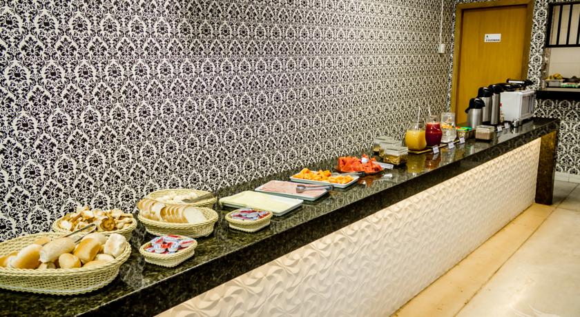 Imagen del bar/restaurante del Hotel Bh Inn Palmares - By Up - Acesso Cristiano Machado. Foto 5