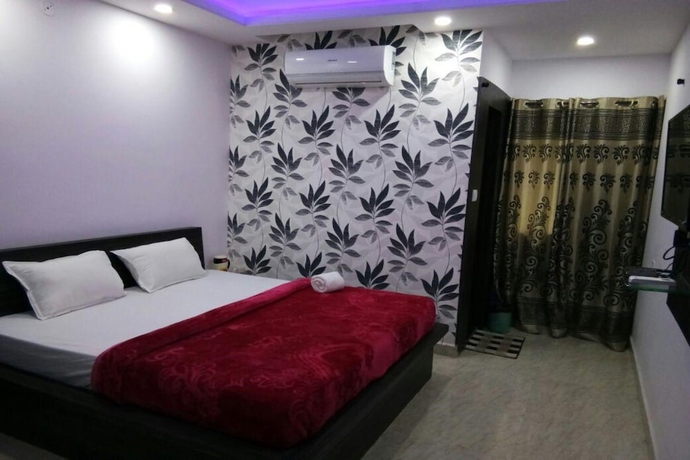 Imagen de la habitación del Hotel Bharat Regency. Foto 7