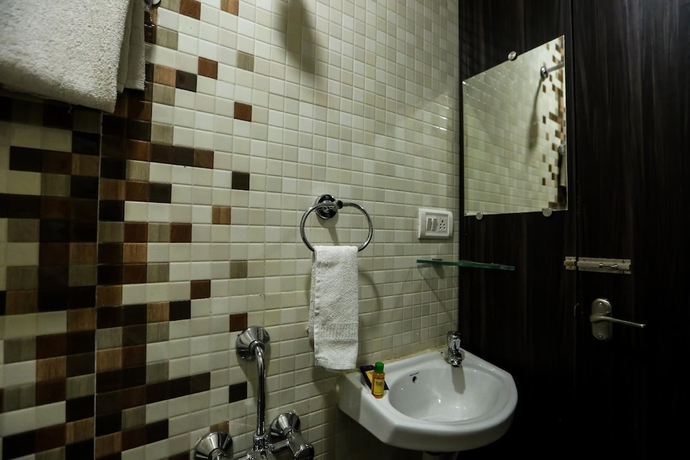 Imagen de la habitación del Hotel Bharat Regency. Foto 14