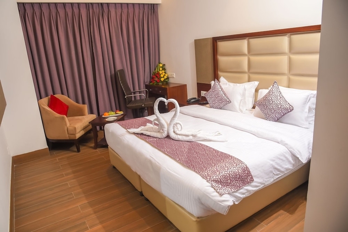 Imagen de la habitación del Hotel Bharawan Clarks Inn Express. Foto 8