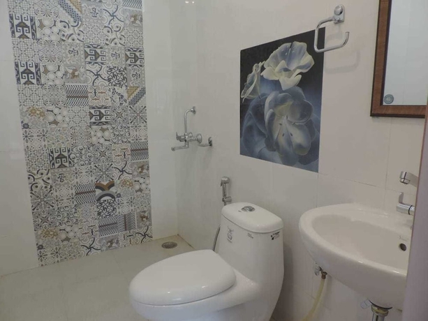Imagen de la habitación del Hotel Bharawan Clarks Inn Express. Foto 12