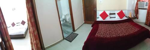 Imagen de la habitación del Hotel Bhawani International. Foto 6