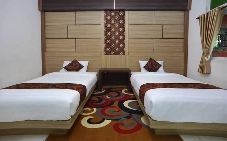 Imagen de la habitación del Hotel Bhinneka. Foto 12