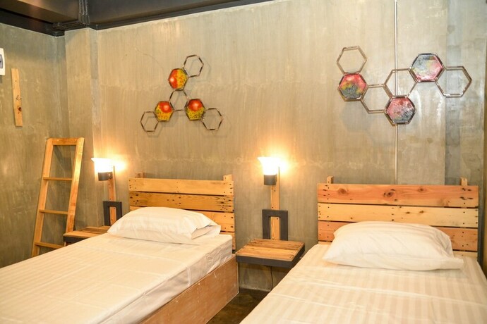 Imagen de la habitación del Hotel Bhive Hotel. Foto 22