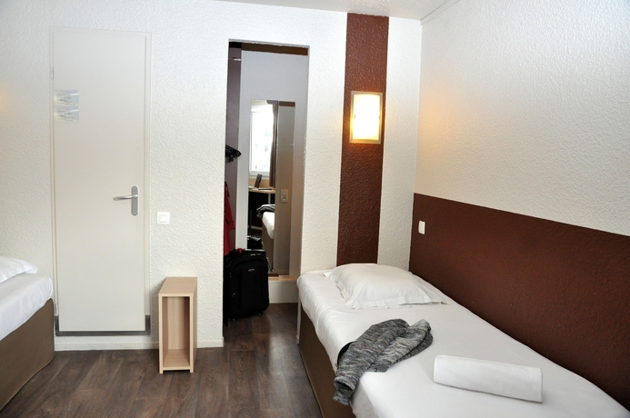 Imagen de la habitación del Hotel Bhôtel De Caen. Foto 11