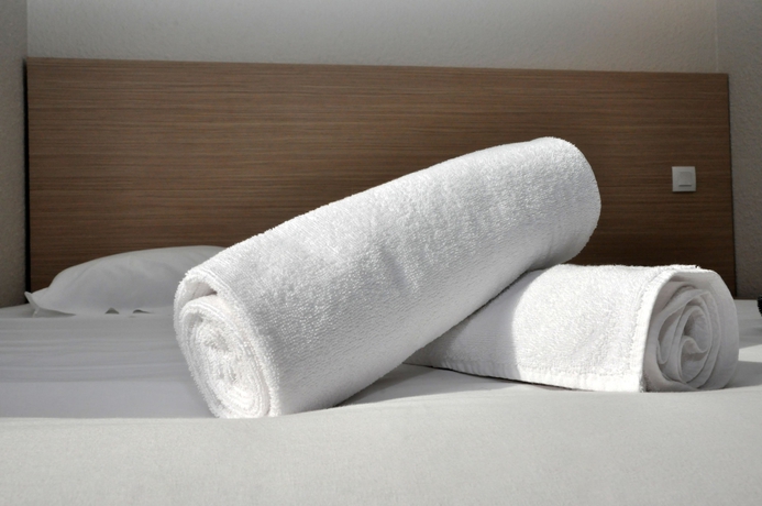 Imagen de la habitación del Hotel Bhôtel De Caen. Foto 17