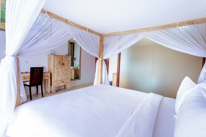 Imagen de la habitación del Hotel Bhuana Agung Villa and Restaurant. Foto 16