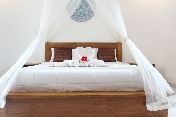 Imagen de la habitación del Hotel Bhuana Shanti Homestay. Foto 18