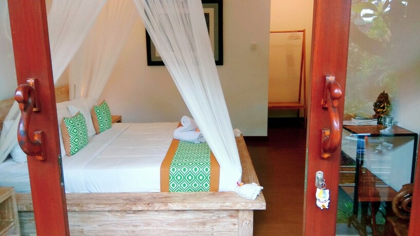 Imagen de la habitación del Hotel Bhuana Shanti Homestay. Foto 19