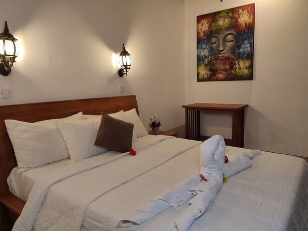 Imagen de la habitación del Hotel Bhuana Shanti Homestay. Foto 25