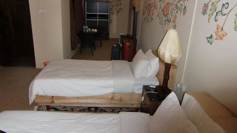 Imagen de la habitación del Hotel Bhutan Metta Resort and Spa. Foto 13