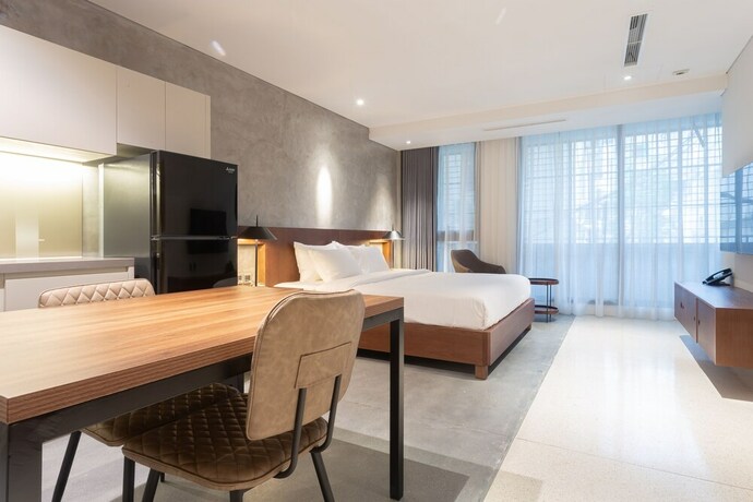 Imagen de la habitación del Hotel Bi Ecosuites Hanoi. Foto 16