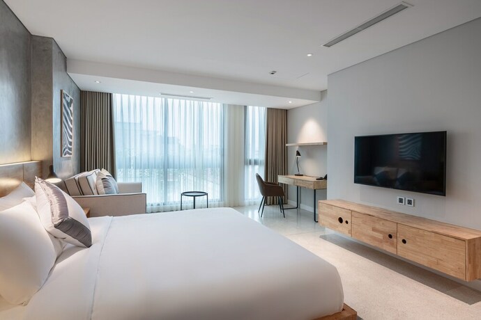 Imagen de la habitación del Hotel Bi Ecosuites Hanoi. Foto 28