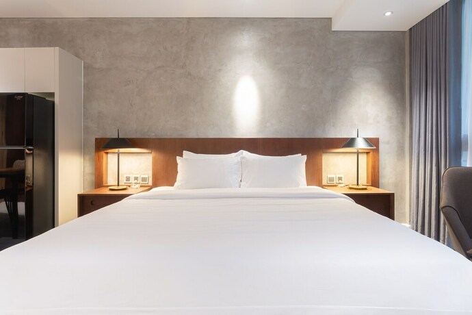 Imagen de la habitación del Hotel Bi Ecosuites Hanoi. Foto 29
