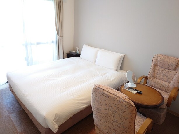 Imagen de la habitación del Hotel BiBi Cosmos Shintoshin. Foto 9
